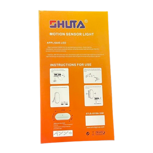 Shuta 30W MOTION SENSOR LED LIGHT OVAL packaging with installation instructions on orange background