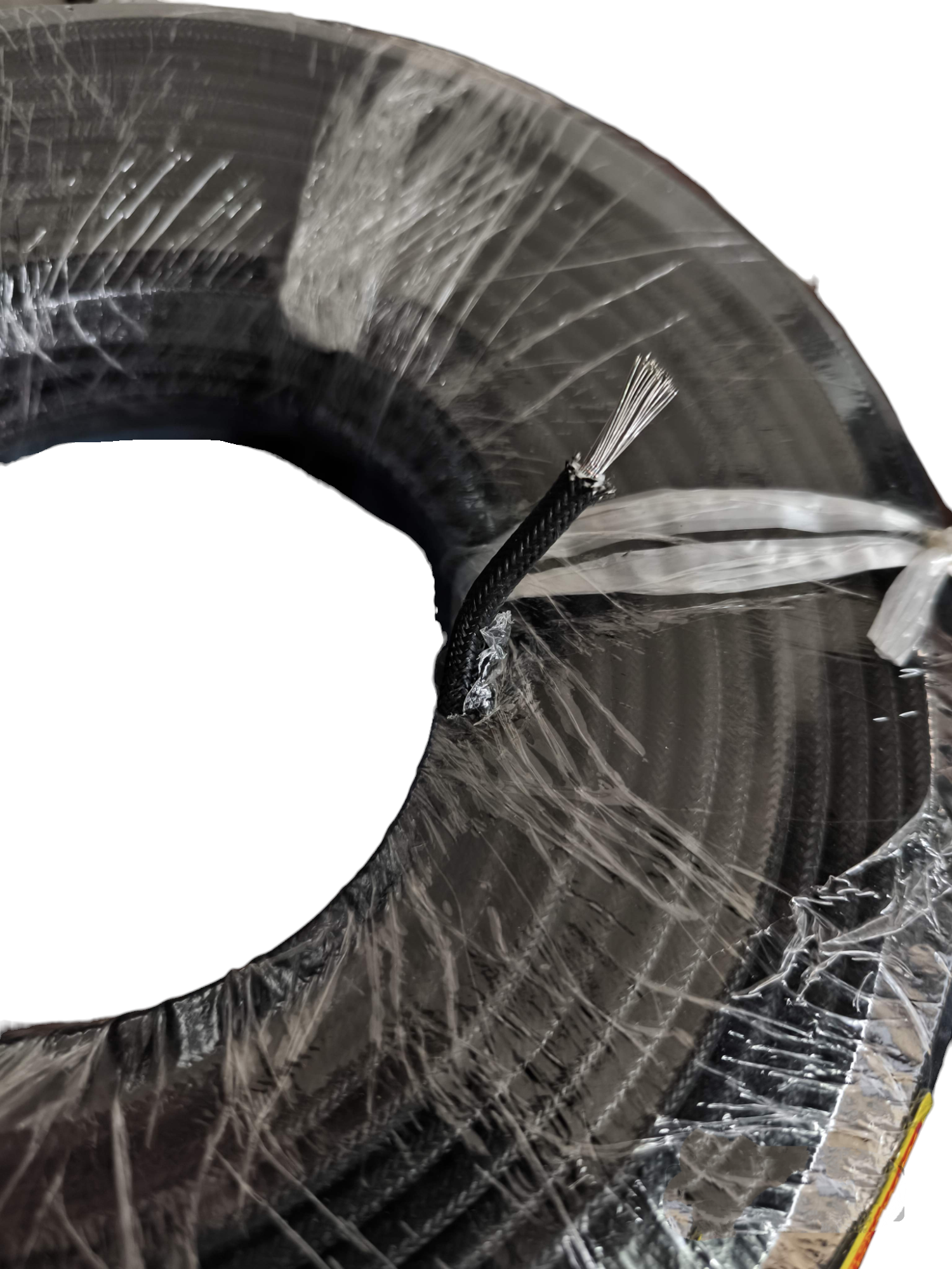 Grippes Silicon Wire 4.0mm Pre Cut coil wrapped in protective plastic with exposed wire end