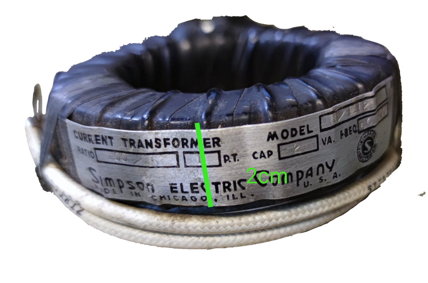 Simpson Single Core Current Transformer black ring style electrical component with white insulated wire