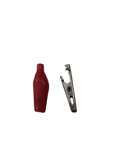 Small alligator clip with red insulating cover for electrical circuitry and parts