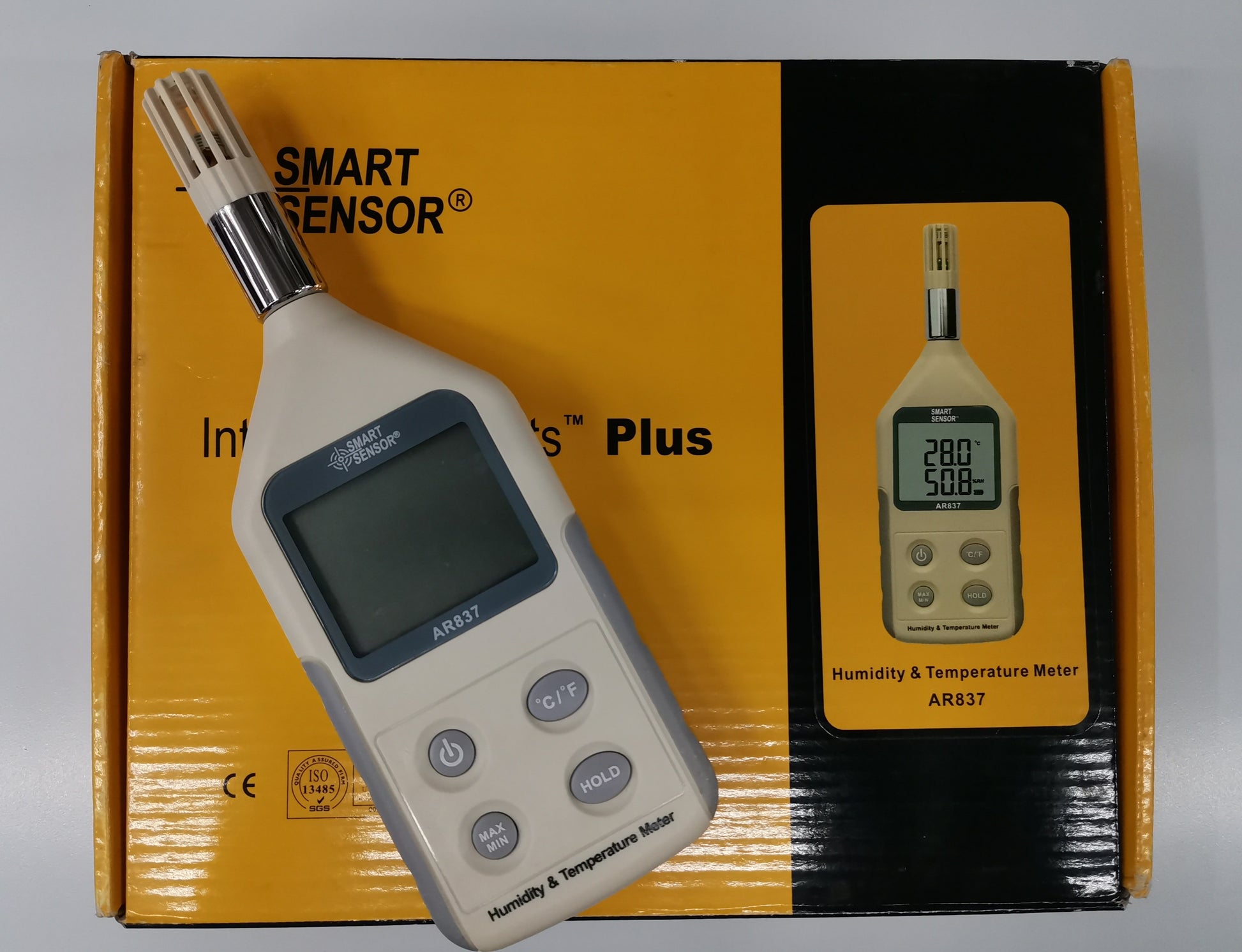 Digital Humidity Tester Smart Sensor AR837 with LCD display and control buttons on yellow and black box