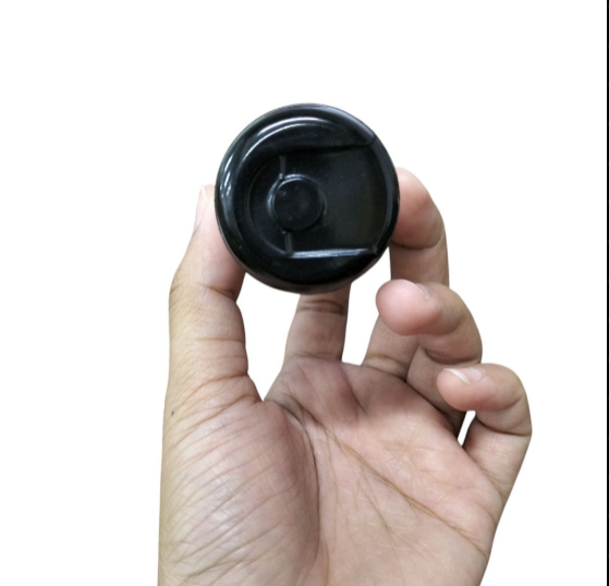 Mallory Starting Capacitor 36-43MFD 125V held in hand, showcasing its compact design and utility.