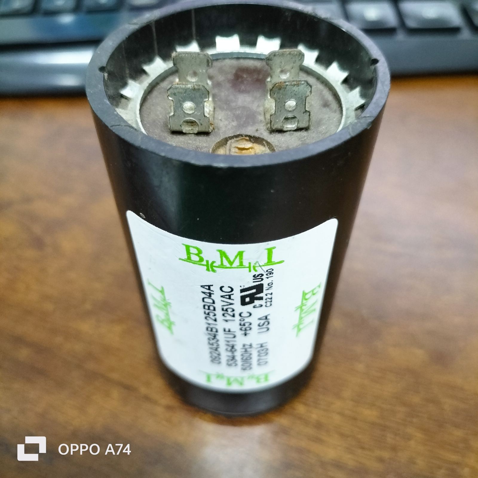 BMI Starting Capacitor 534-641 UF 125V black cylindrical electrical component with metal terminals