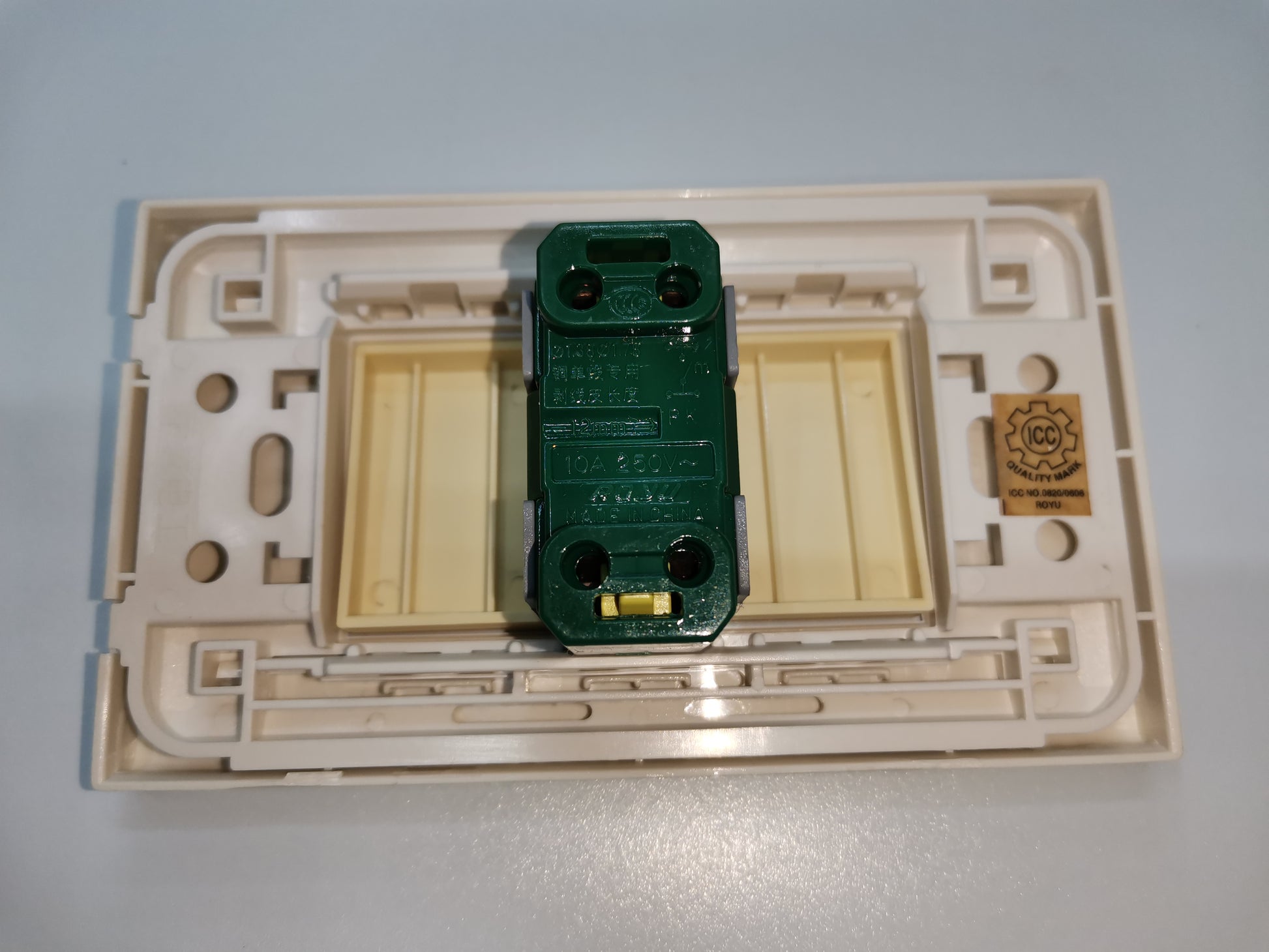 Royu Switch 1gang Flush Type with Led showing back electrical wiring and mounting frame