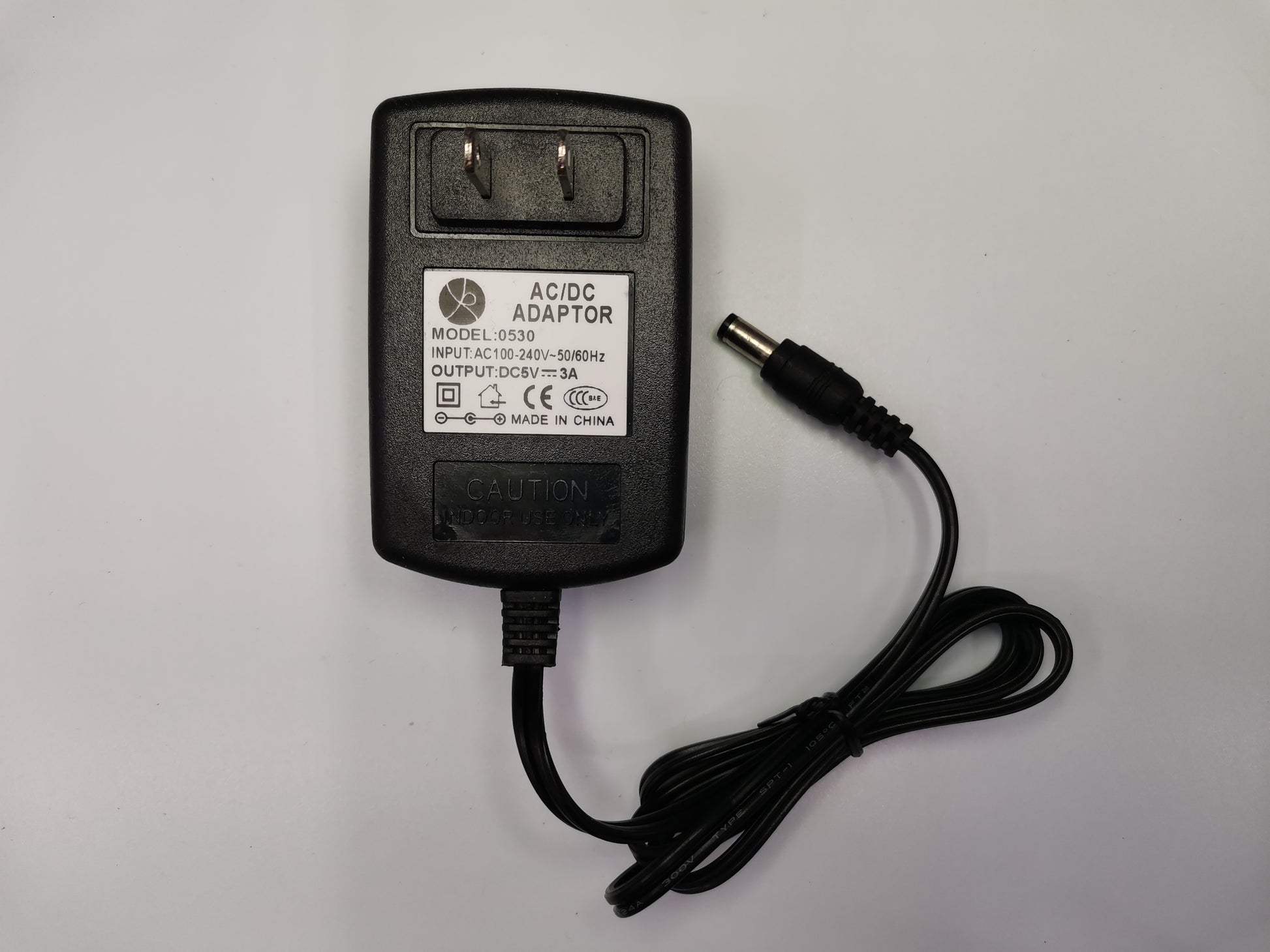 Grippes Switching Power Supply 5V 3A AC DC adapter with US plug and attached cable
