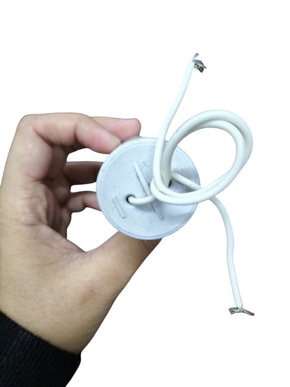 Syscap 14MFD 250 VAC Running Capacitor held in hand with connected wires