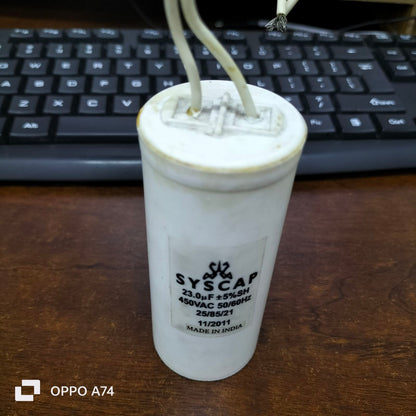 Syscap 23MFD 450VAC motor capacitor white cylindrical electrical component with wires