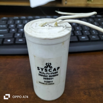 Syscap 36MFD motor capacitor 250VAC cylindrical white electrical component with two wires