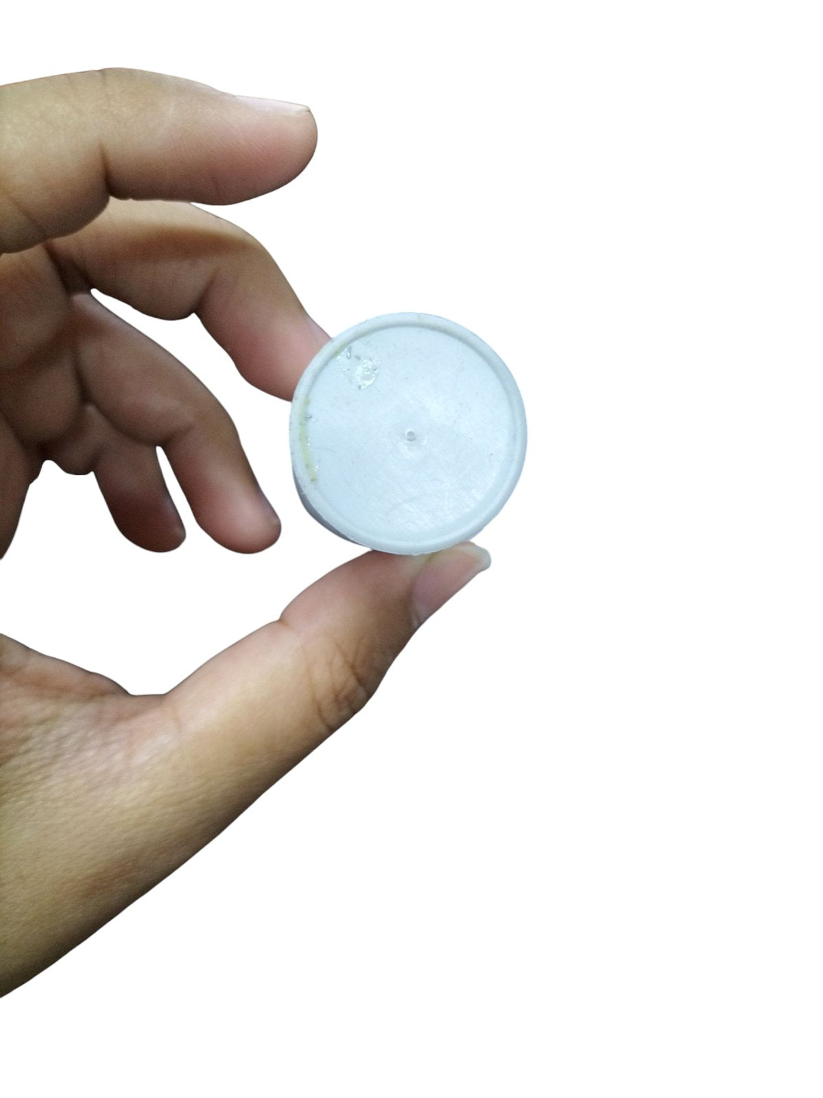 Hand holding a SYSCAP 3MFD 250 VAC Running Capacitor for electrical circuits and parts