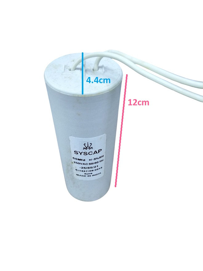 Syscap motor capacitor with cylindrical shape and white wires measuring 12 cm by 4.4 cm