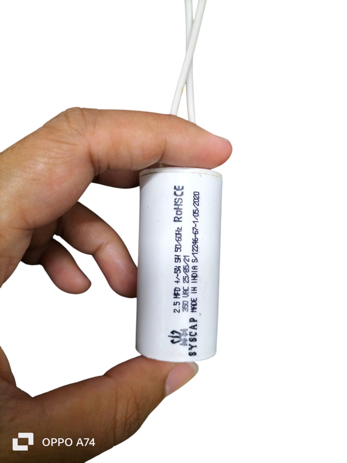 Syscap Motor Running Capacitor 2MFD in Hand, Ideal for Electrical Circuitry Applications