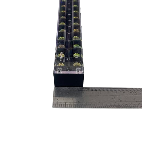 Grippes 60A terminal block 600V with clear casing and precise measurement tools for electrical projects