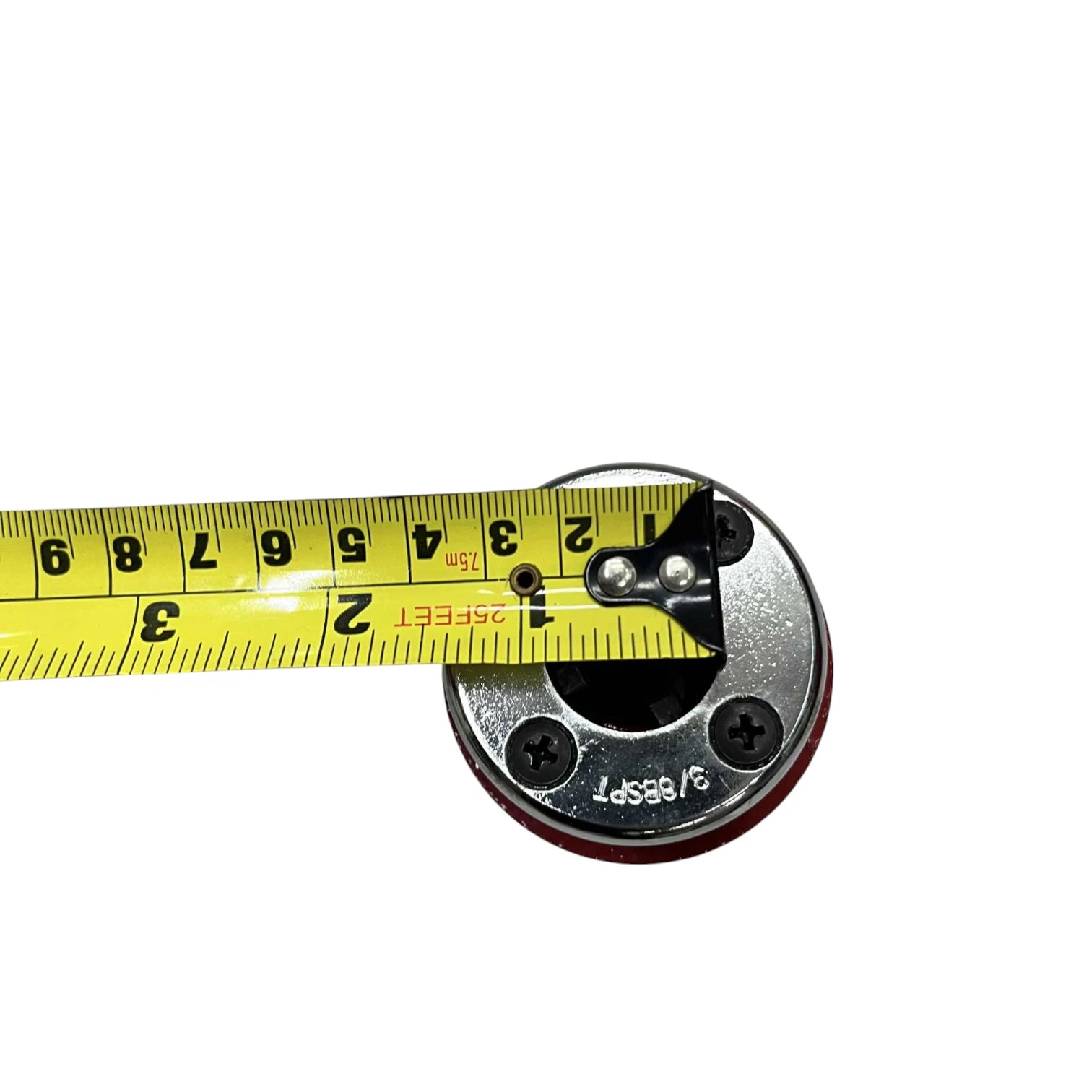 Close up of ratchet pipe threader set round die head with tape measure showing size for plumbing