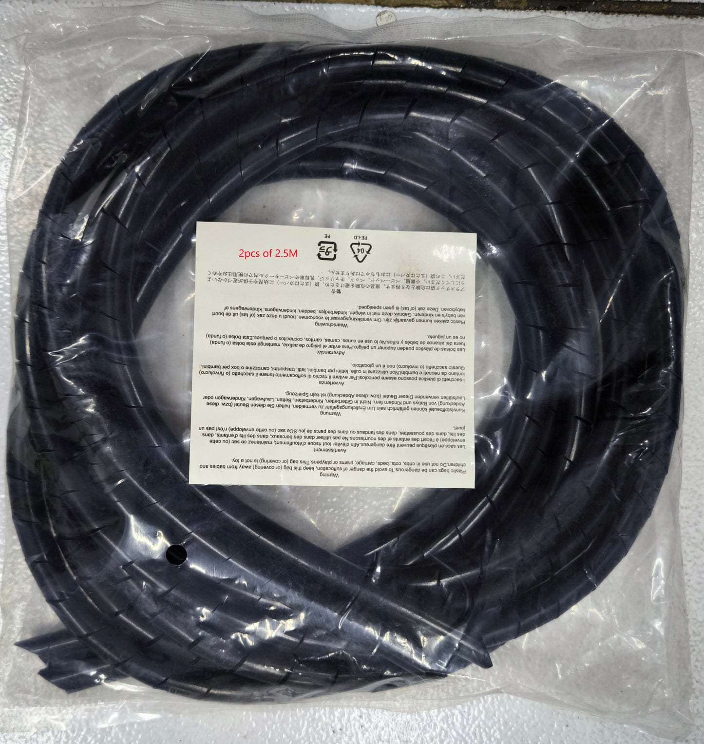 Type G to Type F adapter for Europe power cable coil packaged in clear plastic bag from China