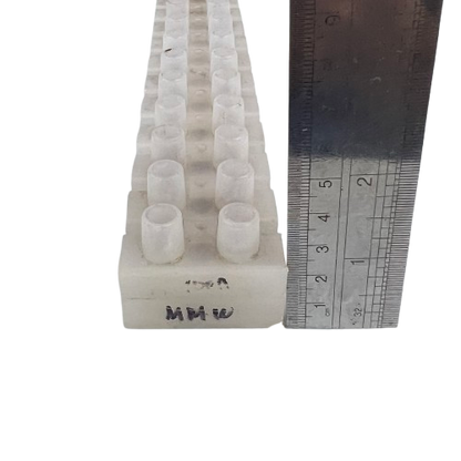 Sassin 100A 12 Pairs PVC Terminal Block white connector with ruler showing scale for electrical safety