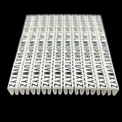 Grippes alphabet cable markers 260pcs white letter clips organized in rows for wire labeling