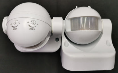 White adjustable PIR Motion Sensor 5A 220V with dual swivel heads and time lux controls for lighting