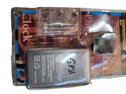 Universal Primary Switching Adaptor in clear plastic packaging for power adaptation and charging