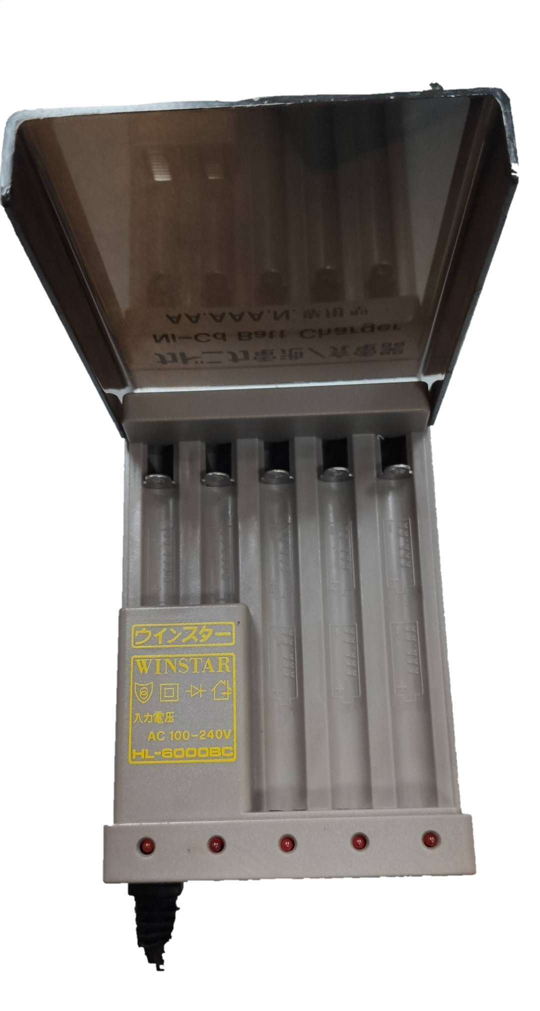 Ni-Cd battery charger for AA and AAA batteries with transparent lid and four charging slots